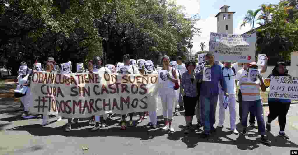 Opositores al gobierno cubano marchan hoy, domingo 13 de marzo del 2016, a pocos días de la visita del presidente Barack Obama a La Habana