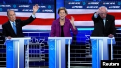 De izq. a der. Mike Bloomberg, Elizabeth Warren y Bernie Sanders.