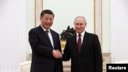 Russia's Putin holds talks with China's Xi in Moscow