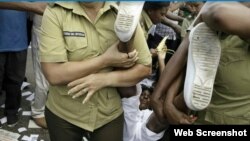 Fotos de arrestos a damas de blanco y activistas en Cuba.