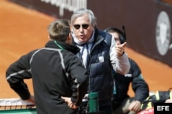 Ilie Nastase (c).