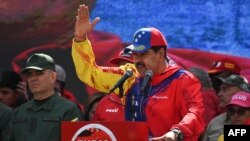 Nicolás Maduro en un acto político en Caracas el 29 de febrero de 2024. Periodistas venezolanos han denunciado que su gobierno busca el control absoluto de los medios de prensa.