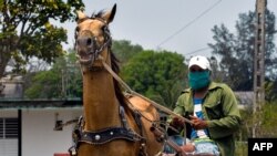 Escena tomada el martes en el poblado del Mariel, provincia de Artemisa (Yamil Lage/AFP).