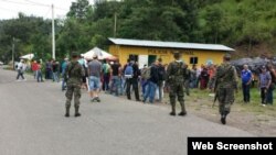 Migrantes arriban a la Aduana de Agua Caliente, Honduras. (Archivo)