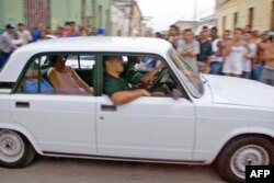 Dos disidentes cubanos arrestados en la Primavera Negra, 20 de marzo de 2003.