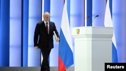 Russian President Putin delivers his annual address to the Federal Assembly in Moscow