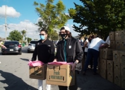 Entrega de alimentos en la iglesia Bautista de la ciudad de Sweetwater.