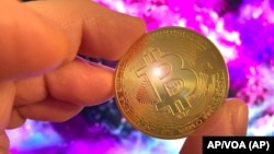 Imagen de un Bitcoin, la criptomoneda líder en el campo de dinero digital, que el 16 de febrero de 2021 alcanzó los 50.000 dólares por unidad.