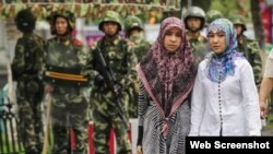 Mujeres de la minoría uigur, en la región de Xinjiang, China.