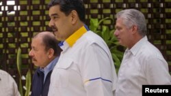 De izq a der. el canciller cubano Bruno Rodríguez, Daniel Ortega, Nicolás Maduro y Miguel Díaz-Canel. Ramon Espinosa/Pool via REUTERS