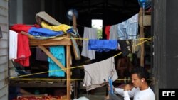 Fotografía del 31 de julio de 2016 de ciudadanos cubanos en tránsito en la población de Turbo, Colombia. 